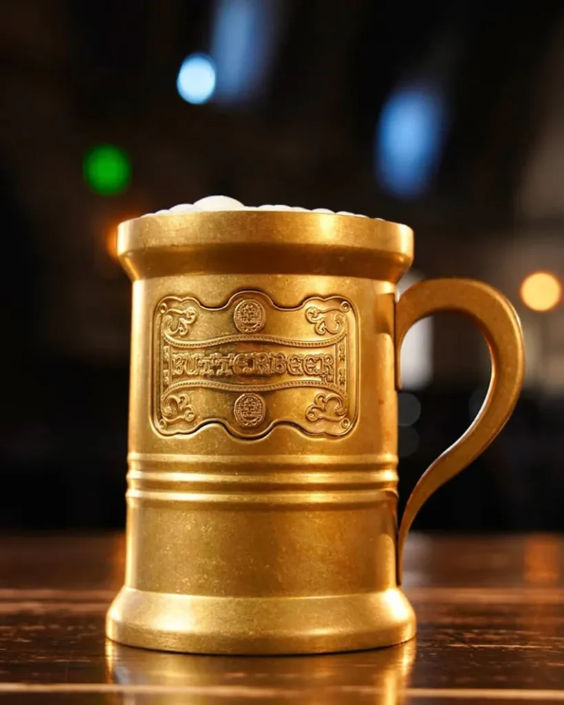 Gold decorative glass of butterbeer