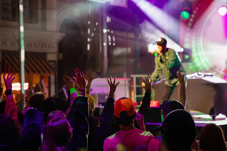 Christian Show Rock the Universe shows audience with a singer on stage